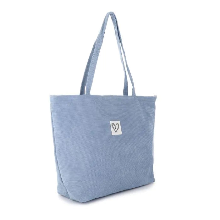 Ribfluwelen tas blauw