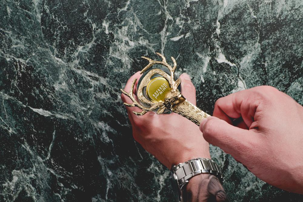 Flesopener rendier goud