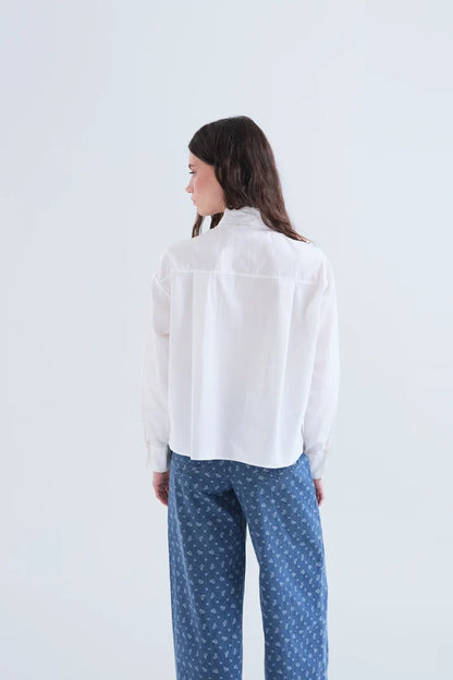 Witte blouse strik