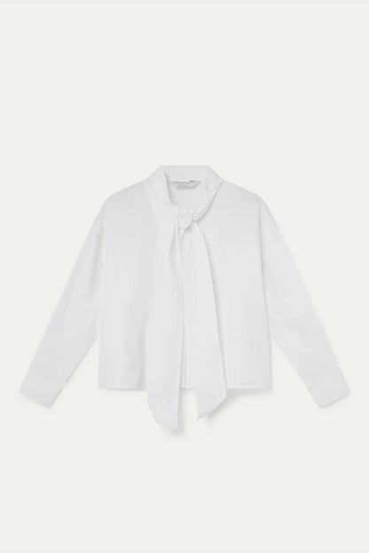 Witte blouse strik