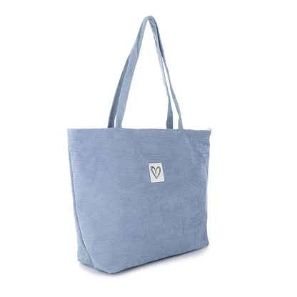 Ribfluwelen tas blauw