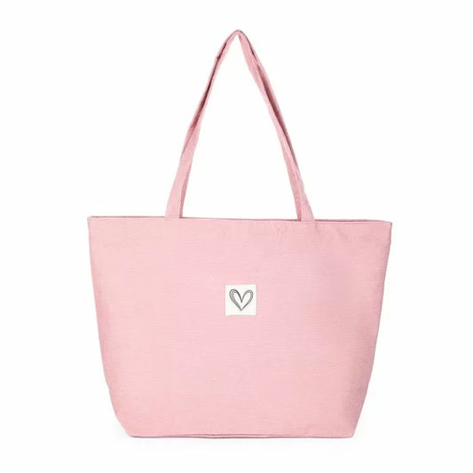 Ribfluwelen tas roze