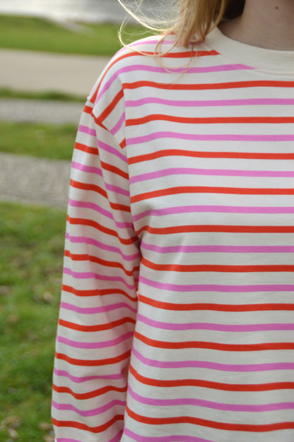 Sweater rood-roze streepjes