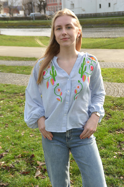 Gestreepte blouse met borduursel