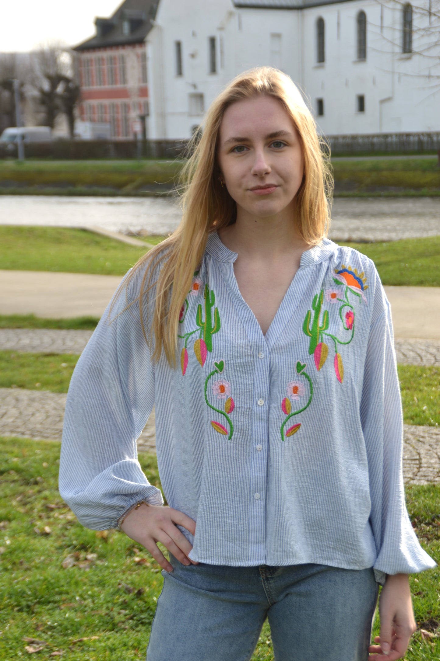 Gestreepte blouse met borduursel