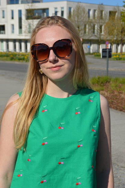Groene top met kersenprint