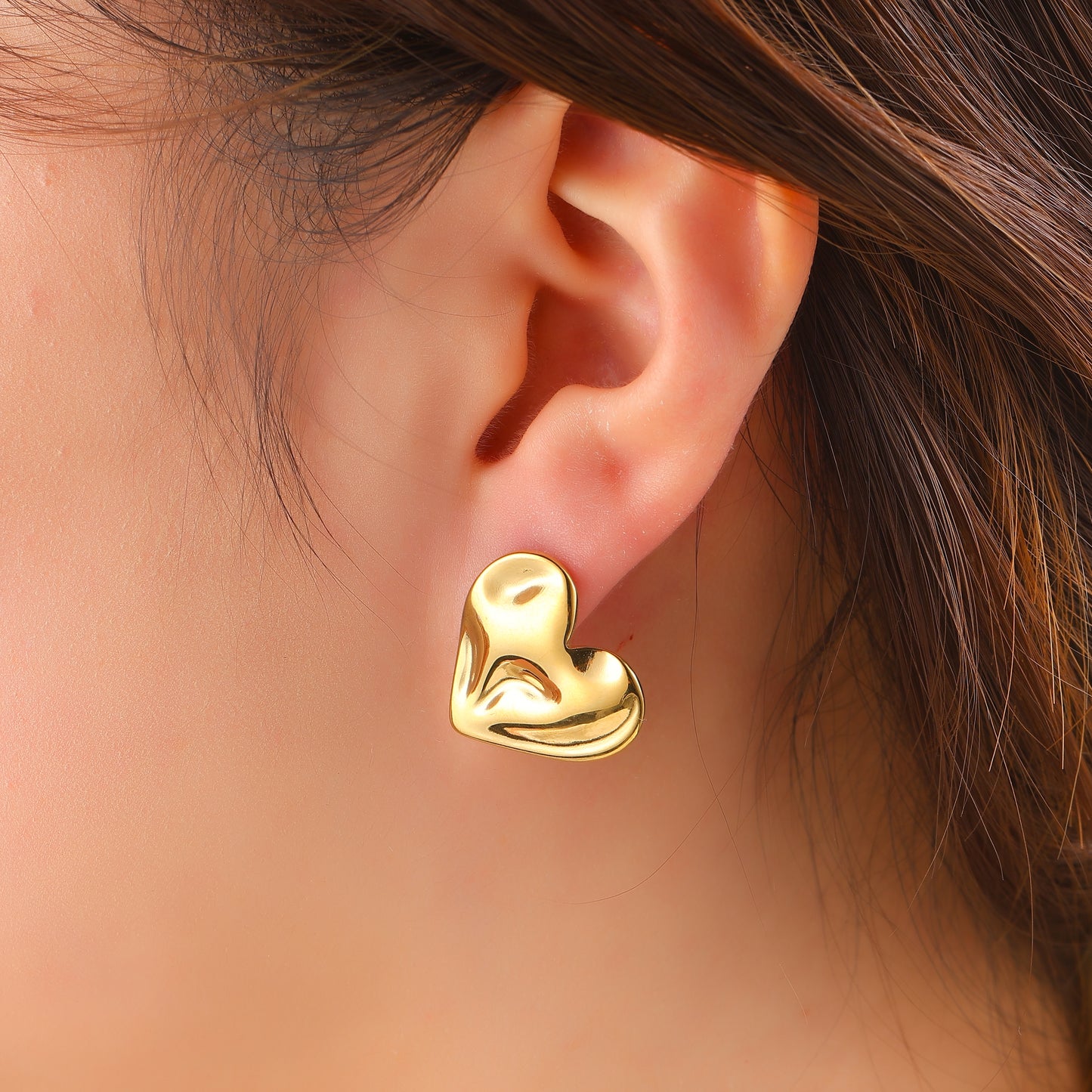 Oorbellen Wavy Heart - Goud